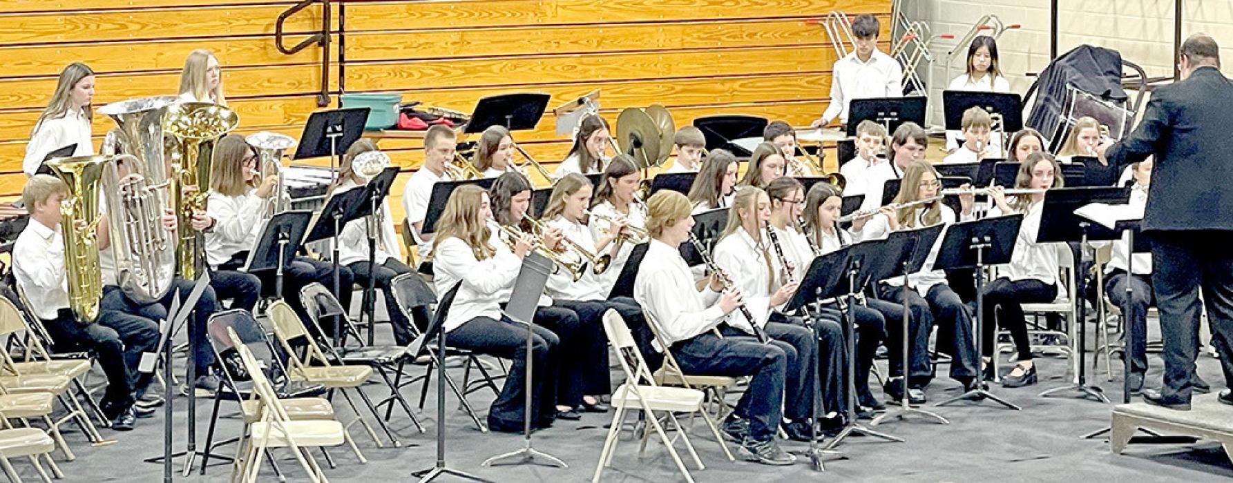 The junior high band showed their skill on All Through the Silent Night and All I want for Christmas Is You. (Photo by Sara Anderson)