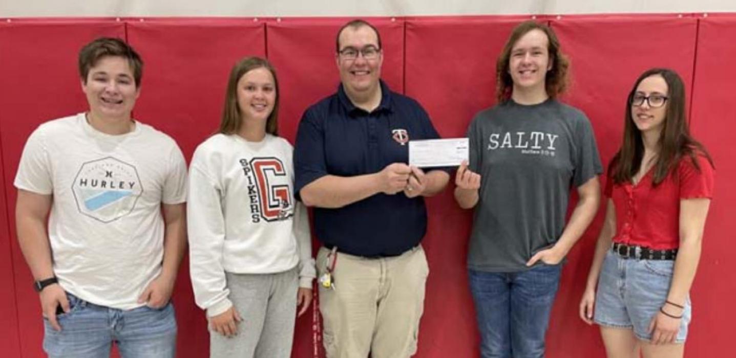 NHS officers present a check for $1,000 to Jared Opp, member of the Gregory pool fundraising committee. Pictured l to r: Jaden Graber, Jessy VanDerWerff, Jared Opp, Christian Spann, and Samantha Reinartz. Not pictured are Gracie Kenzy and Dakota Timanus. (Submitted photo)