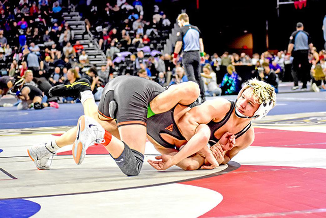 Dane Johnson, at 106 pounds, was the Storm’s only place finisher at the state tournament. (Photo by Kamre Peabody)