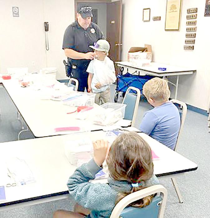 On Friday, July 19th, Gregory County 4-H held a first-aid workshop that was led and taught by Mark Green. Youth put together first-aid kits and learned how to use a CPR mask, wrap bandages, making a cloth sling, and many other useful items. Youth also were taught skills from Mark like how to perform the Heimlich maneuver, how to apply a tourniquet, and what to do in different situations. At the end of the day youth got to take their own firstaid kits home.