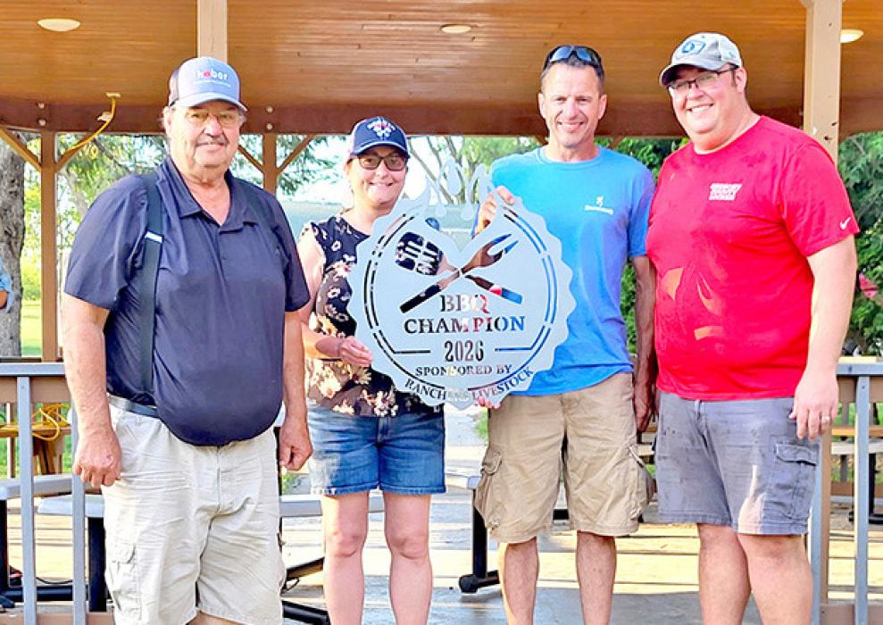 “Opp”eration Smoke operated well at Ribfest and took home the Pit Master trophy on Saturday. Michelle Birkeland and Jim Birkel presented Bruce and Jared Opp with the grand prize.