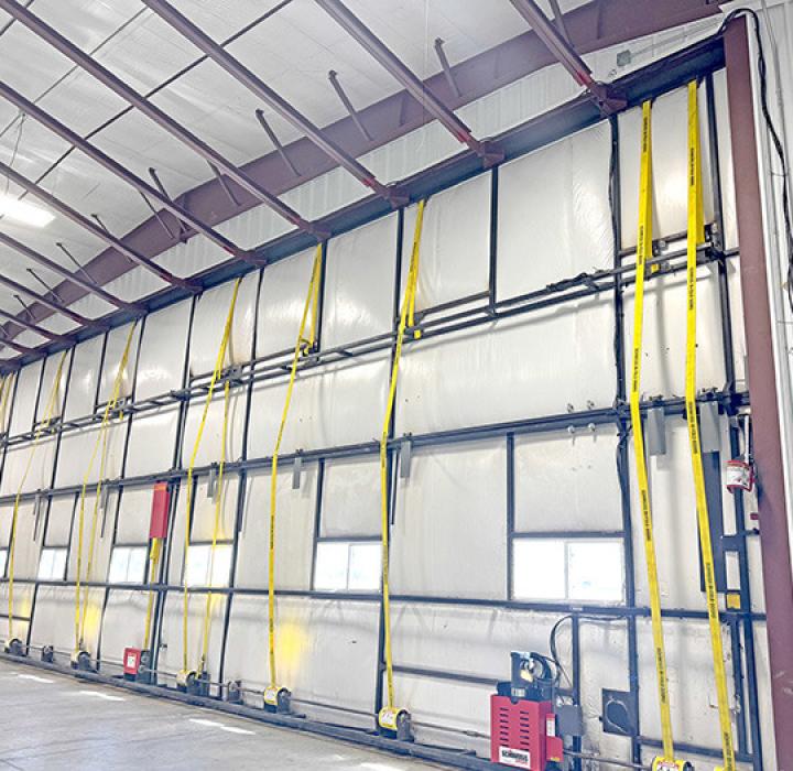 The new strap system on the hangar doors is a safety and maintenance upgrade for the large door on our hangar. The original system was cable that could fray and snap causing a dangerous situation to both pilots and planes. The new strap system was recommended by Mr. Dave Howard of Winner and the original door installers, Schweiss Door Co. To help pay for the upgrade, the finance offices turned in airport receipts to claim the last $22,000 available to the city from the Airport Covid Program.