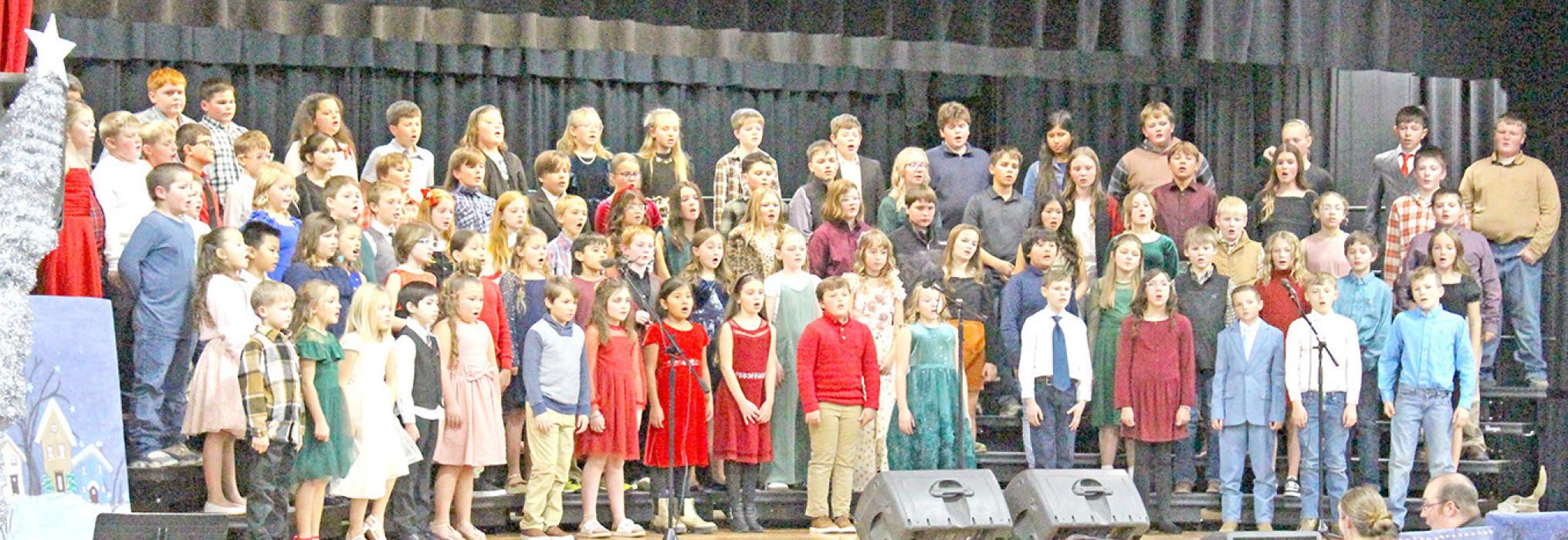 The 3rd-5th grade students joined forces for Holly Jolly Jalopy, a collection of seven songs and a finale, for the second half of the holiday concert program.