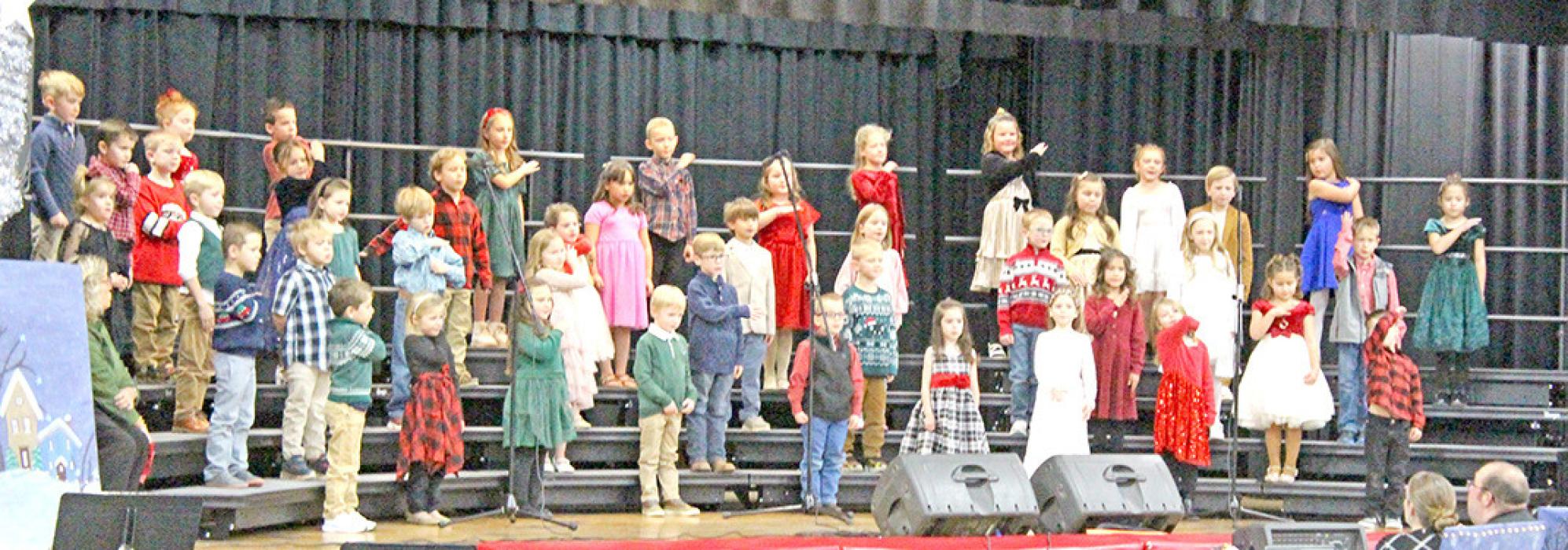Begindergarteners and kindergarteners entertained the audience with Nice, Not Naughty and Turn Off That Nose!