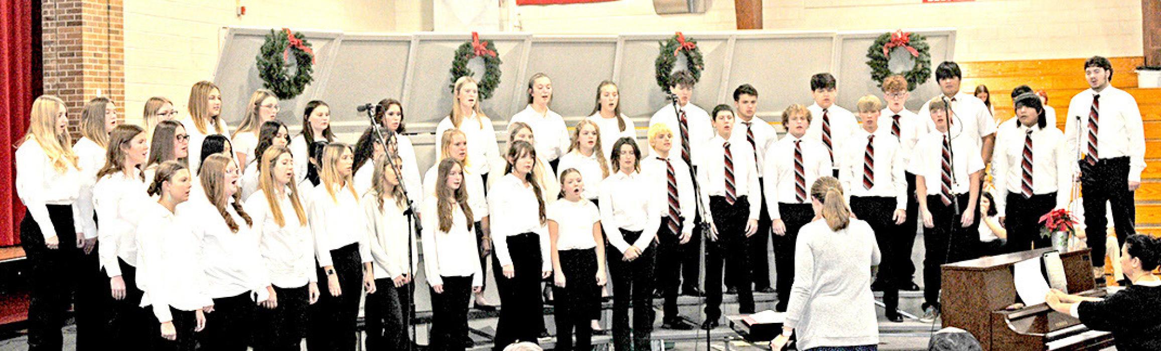 The high school choir tackled a foreign language song, ““Eatnemen Vuelie,” and “And Seeet Singing in the Choir.”