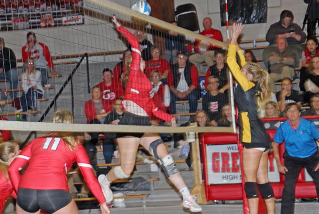 Mya Determan goes up for an attack in front of a home crowd against AC/DC.