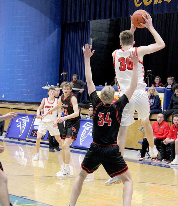 Colt Keiser was a force on the boards with 11 points and 8 rebounds. (Photo by Sara Anderson)