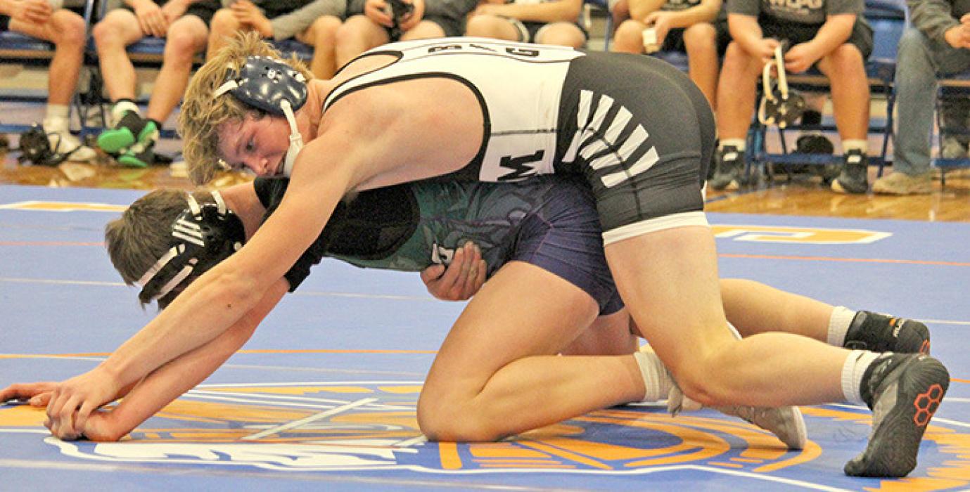 Mason Janak won one of his two matches at the Parkston triangular Monday night in Parkston. (Photo by Gracie Stephens)