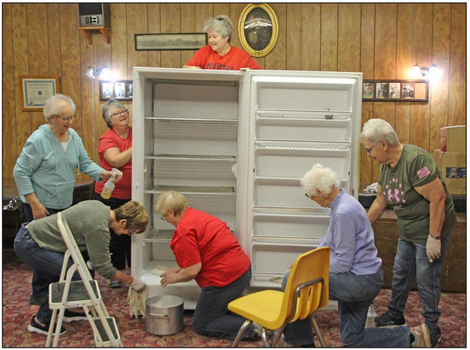 	How many women does it take to clean one freezer?!