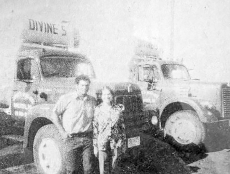 John and Kathy Divine with their first fleet, two mixer trucks, in 1975. (Submitted photo)