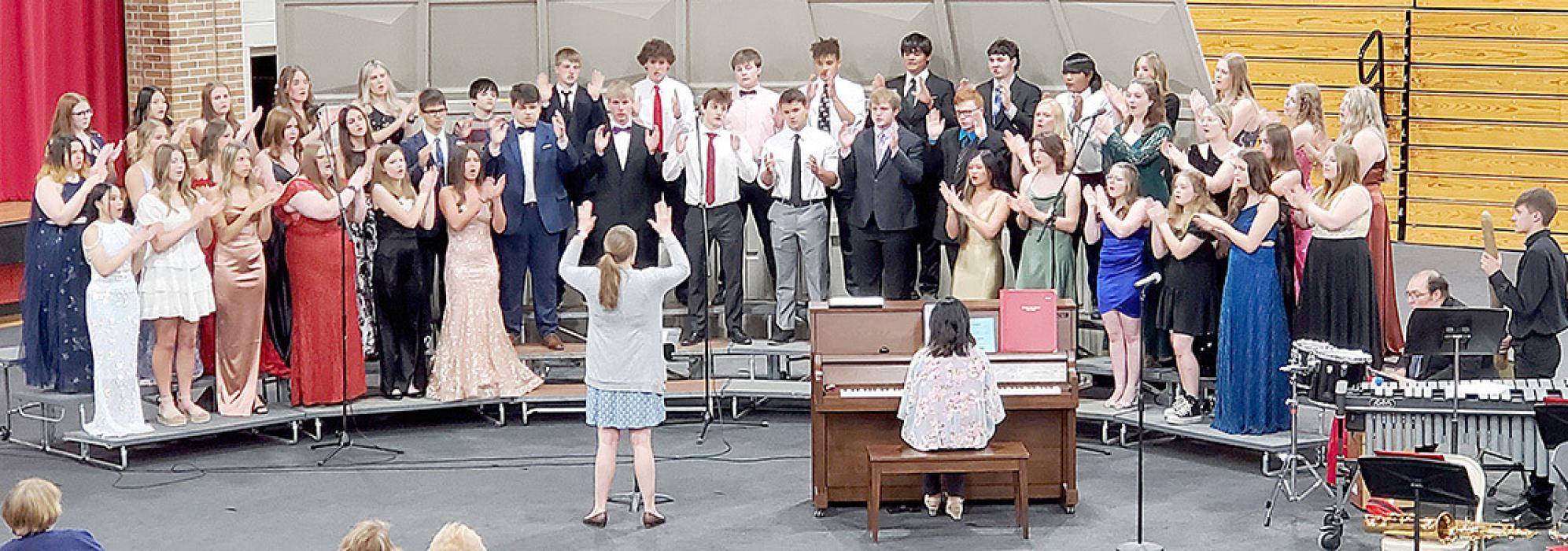 The high school choir performed a wide variety of genres, starting the evening with piece freely based on three Brazilian tribal songs, moved into a familiar Irish song, “Danny Boy,” a song of hope, “Ad Astra (To the Stars),” and concluded with a gospel hymn, “He Never Failed Me Yet.”