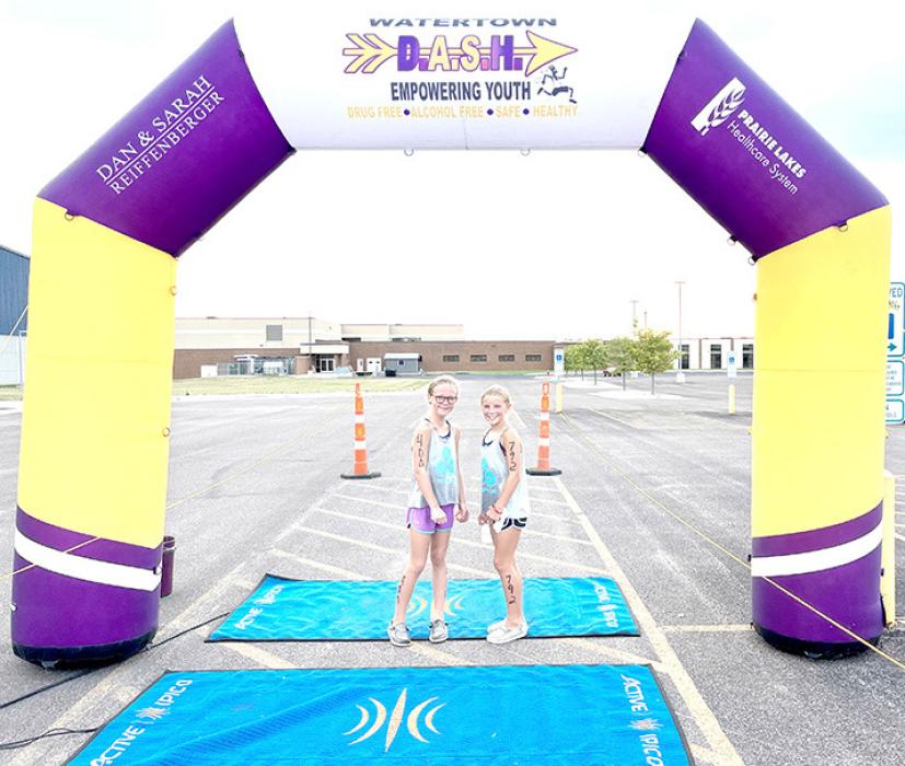 Stukel/Warnke participate in triathlon in Watertown