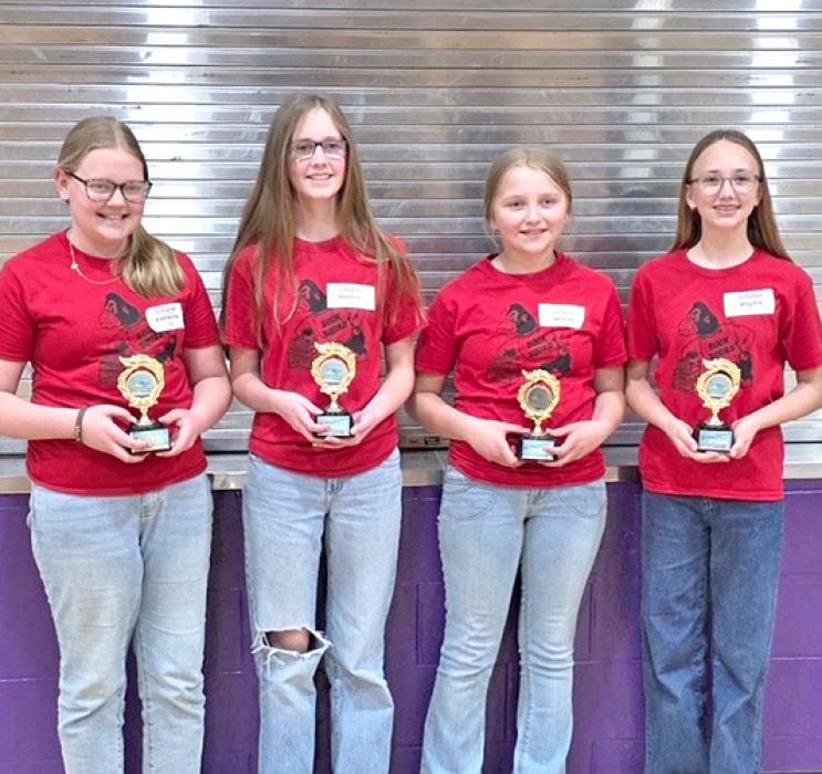 Pictured l to r, Katherine Engel, Hannah Hull, Nevaeh Pore, and Mayme Reber of the 6th grade team earned a third place finish.