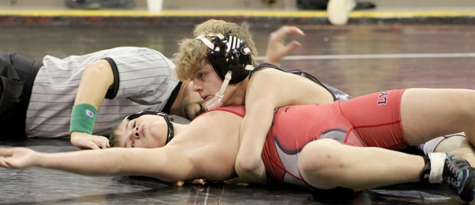 Moxon Fox won his match against a Lyman opponent, pinning him in 3:34 in front of the home crowd on Tuesday, January 4. (Photo credit: Ashton Eklund)