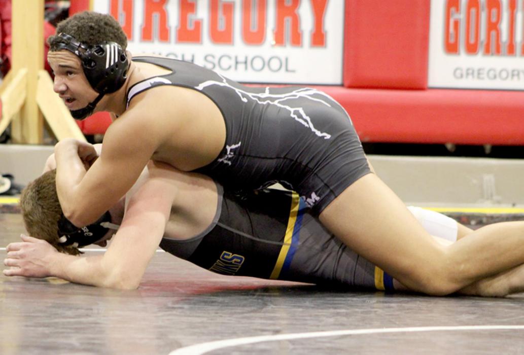 Coach Webster bumped Gunnar Stephens up to 195 pounds for the triangular on January 4 so that he could wrestle against Camden Jost of Wessington Springs/Woonsocket/ Wolsey-Wessington. Stephens rose to the occasion, beating Jost in a 6-4 decision. (Photo credit: Ashton Eklund)