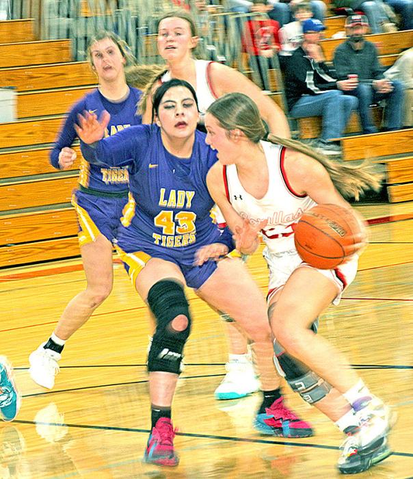 Jessy VanDerWerff makes her way around a White River defender in Gregory’s 57-40 win Monday night.