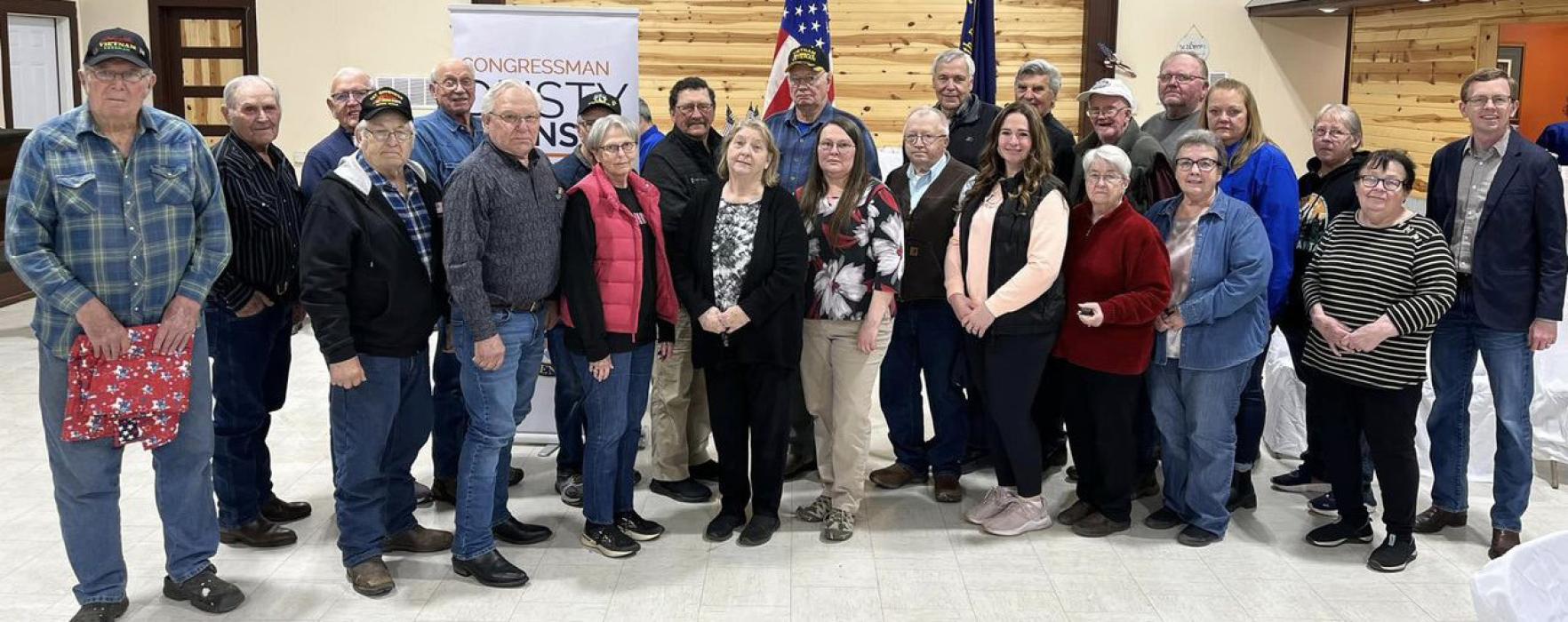 Those recognized were back row l tor: Don “Skip” Emme, Ray Schmitz, John Applebee, Dan Schmitz, Ed Jons, Gary York, Frank Heagney, Norbert Koenig, Bill Lampman, Bob Fenenga, AJ Jensen, Sonya Fernau, Darlene Johnson, Rep. Dusty Johnson. Front row, l to r: Larry Allyn, Marvin Schmitz, Connie Schmitz, Nettie Pepper, Jeanne Davis, Dennis Lyon, Jamie Silver, Dorothy Boes, Colleen Taylor and Arlie Kulm.