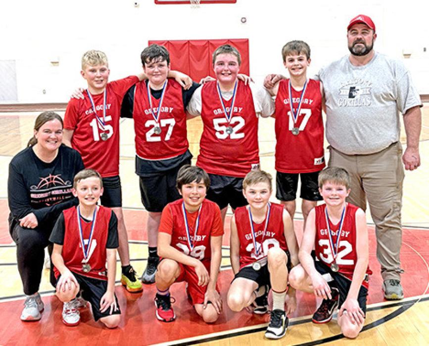 Gregory defeated Valentine and Ainsworth during the Valentine tournament. Pictured back row l to r: Kade Beck, Dawson Stukel, Ian Opp, Dylan Bolander, and Coach Blaine Bolander. Front row l to r: Coach Katie Bolander, Aiden Stevicks, Joe Braun, Bryden Dehning, and William Bolander.