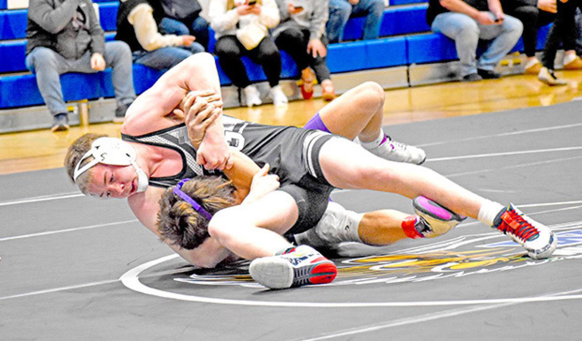 Wyatt Beck earned three pins to claim first place at Redfield. (Photo by Kamre Peabody)