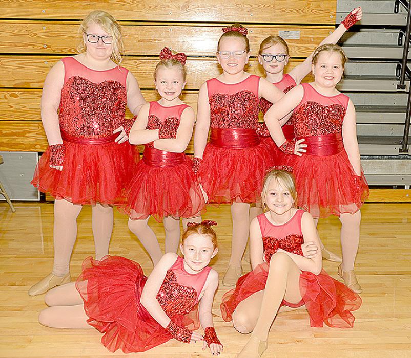 Placing first in the Jazz - Mini Division with their performance of “We Got the Beat” were back row, l to r: Sophie Kerner Andersson, Paisley Graber, Alese Van Metre, Jaque Smith, and Taylor Nolan. Front row, l to r: Ashlynn Warnke and Lily Vomacka.