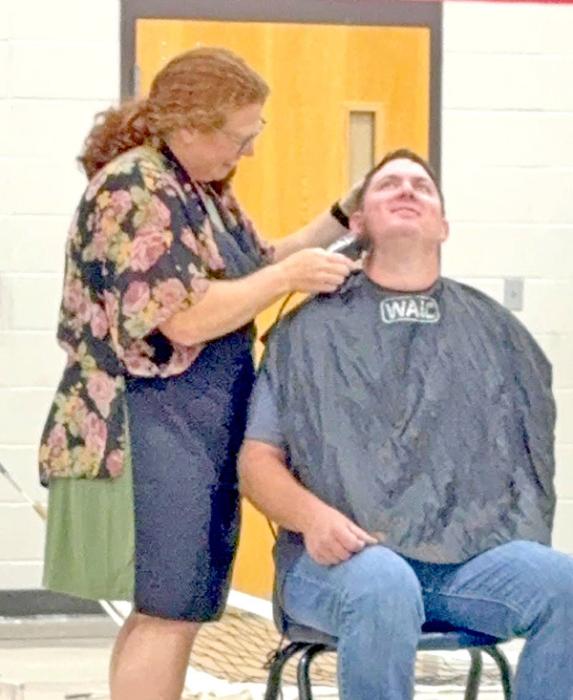 Mr. Begeman’s wife had the honor of shaving his beard.