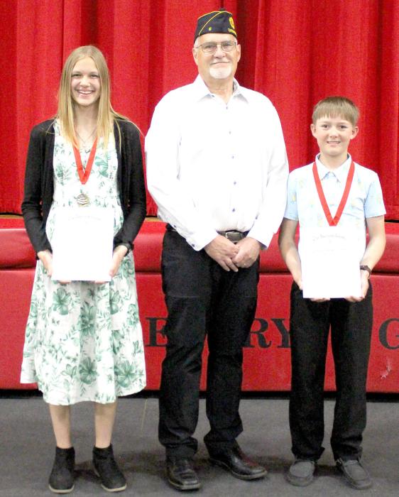 The Gregory American Legion awards were presented to eighth grade students. The winners of the Legion awards were presented by John Knight, First Vice Commander, center, to Abigail Engel, left, and Andrew Lutt, right. (Photo by Alexis Kortan)