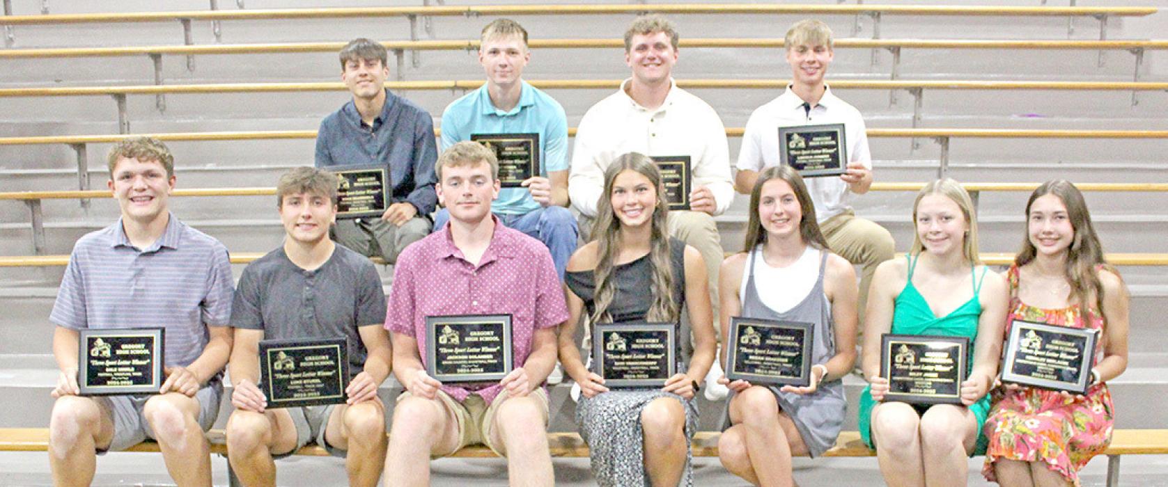 Three sport letter winners are, back row, l to r: Noah Bearshield, Colt Keiser, Rane Kenzy, and Lincoln Juracek; front row, l to r: Landon Keiser, Luke Stukel, Jackson Bolander, Dani VanDerWerff, Regan Graesser, Miley Janak, and Kennley Sedlacek. (Photo by Alexis Kortan)