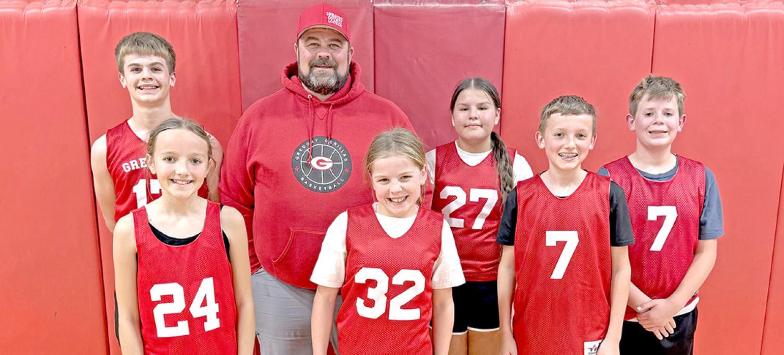 Runners-up in the 5th-6th grade division were the Duke Blue Devils team, shown l to r: Dylan Bolander, Alaina Stevicks, Coach Blaine Bolander, Rowan Wenger, Lashya Graesser, Aidan Stevicks, and Sully Sperl.