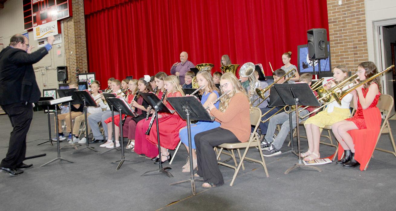 The fifth grade band kicked off the Gregory Elementary holiday concert, showing off their skills with Holiday Fanfare and Jingle Bells.