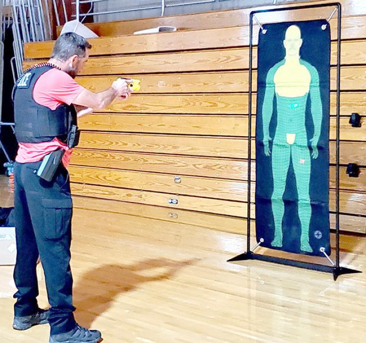 The officers practiced several different scenarios in which tasers could be used, first on a static figure and then on a live target.