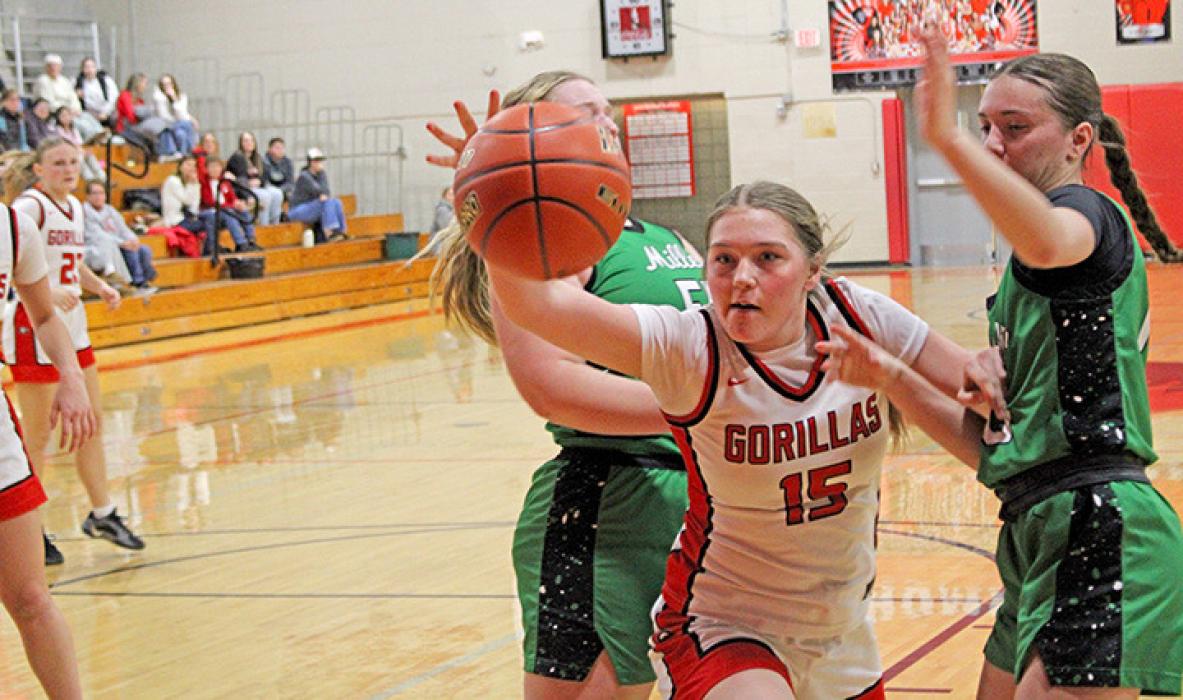 ReNae Prokopec fights through Miller players for the ball.
