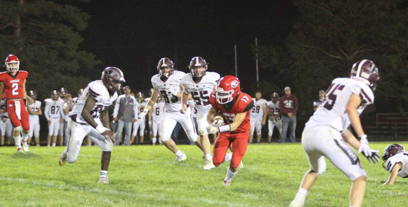 Kade Stukel, #17, is surrounded by Black Panthers as he looks for an opening. He had one reception for a gain of 27 yards in the game.
