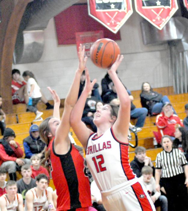 Ella Sperl goes up for two against a Wagner defender at home on Tuesday, February 6.