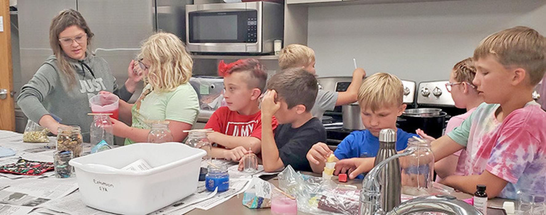 On Friday, July 7, Gregory County 4-H, with the guidance of Rose Wolf, got youth together to learn how to make candles during our candle making workshop. The participants learned about the science of making candles, including steps such as how to melt wax and what to look for when making a beautiful center piece.