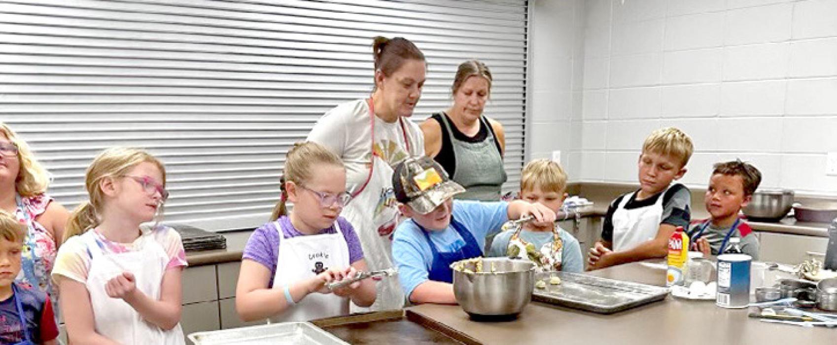 On Thursday, July 6th, Gregory County 4-H youth stepped into the kitchen for the Bake-A-Thon workshop. Under the guidance of Suzanne Braun, they were able to experiment and test their baking skills, making a wide variety of tasty treats and goodies. The youth learned about the science behind baking and some basic skills that they can use at home.