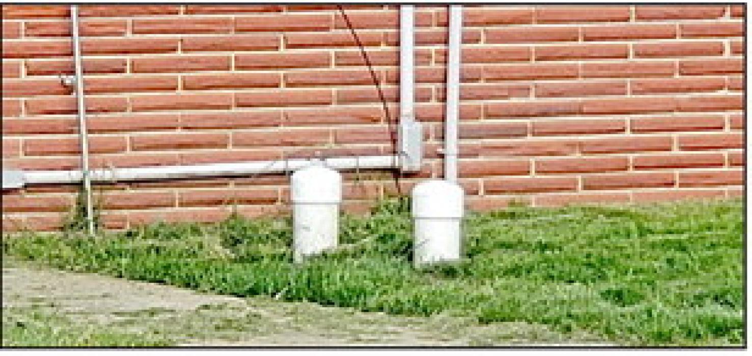 Sewer clean-outs, such as the ones shown here, are supposed to have caps to keep unwanted debris out. The city will soon be cracking down on property owners without caps, although no specific action has been decided yet.
