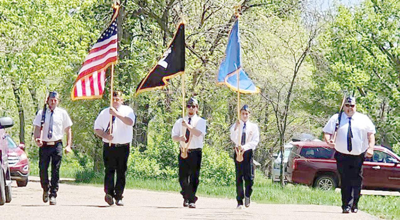 Gregory Post of Sons of the American Legion present flags to kick off the carnival.