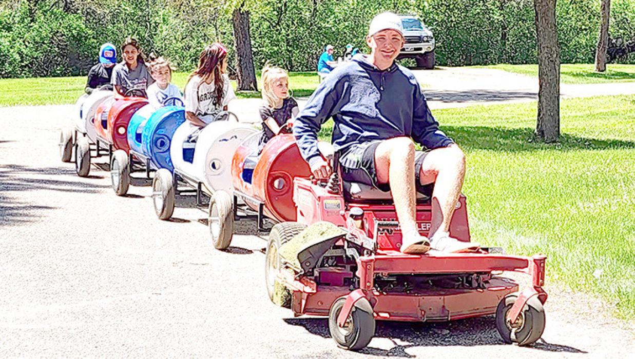 Children of all ages enjoy barrel train, driven by Quinten Bull.