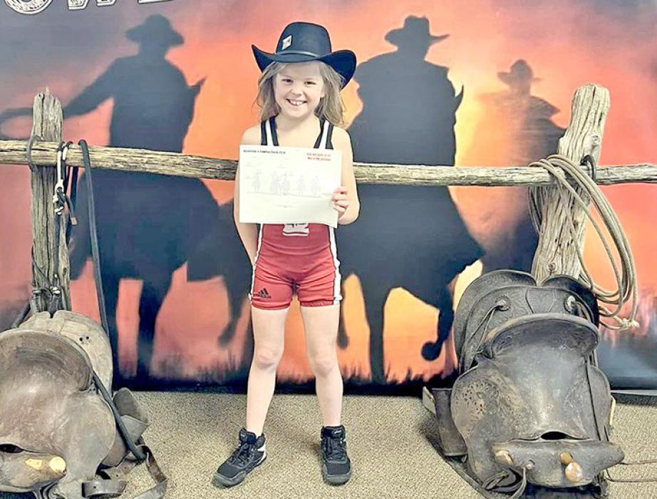 Rowan Wenger got tired of sitting on the sidelines watching her brothers last year and joined AAU wrestling midseason. (Photo used with permission.)