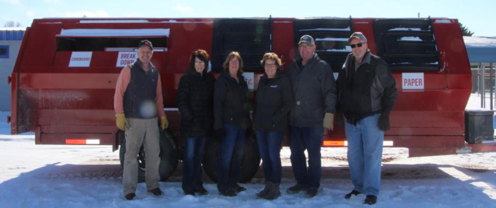 The new recycling trailer came into operation in February 2021. Closed recently for reconfiguration, it will reopen on Thursday. Committee members are shown above, l to r: Scott Anshutz, Guyla Husman, Cheryl Duimstra, Terri Bartling, Blane Bartling, and Gregg Drees.