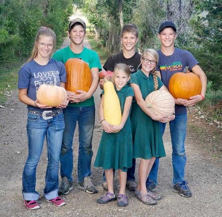 The Pumpkin Patch crew members are shown above, back row, l to r: Nathan, Jeremiah, and Manager Malachi; front row, l to r: Patience, Hosannah, and Mariah.