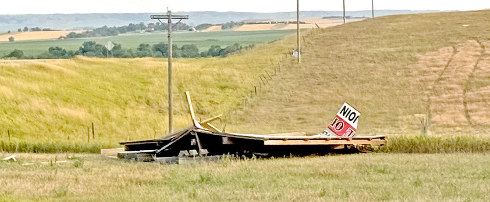 This sign at the intersection of Highways 44 and 47 was destroyed. (Photo by Sara Anderson)