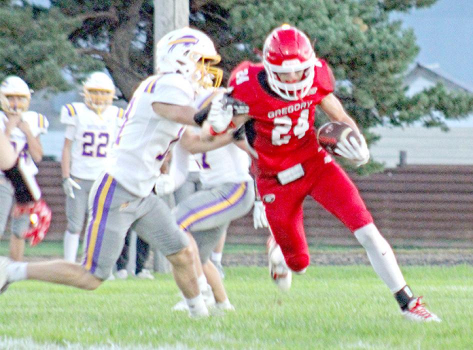 Avery Sengelmann fends off a Buffalo tackle. (Photo by Maya Hull)