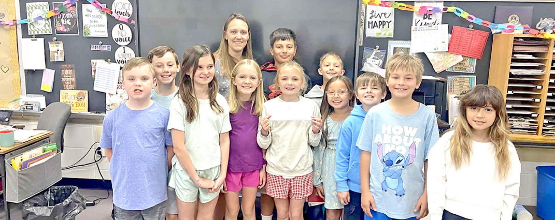 Because the Help Squad members are in Mrs. Reber’s 2nd grade class, they chose to share part of their earnings with her sister, who is pregnant with a baby with spina bifida. (Submitted photo)