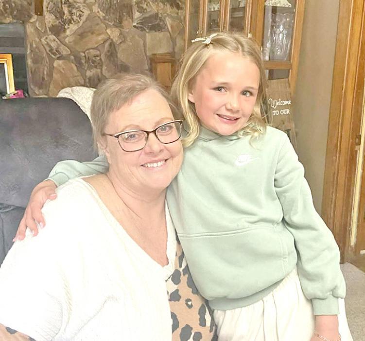Oaklee presented the money to her after-school provider Amy Meinen. (Submitted photo)