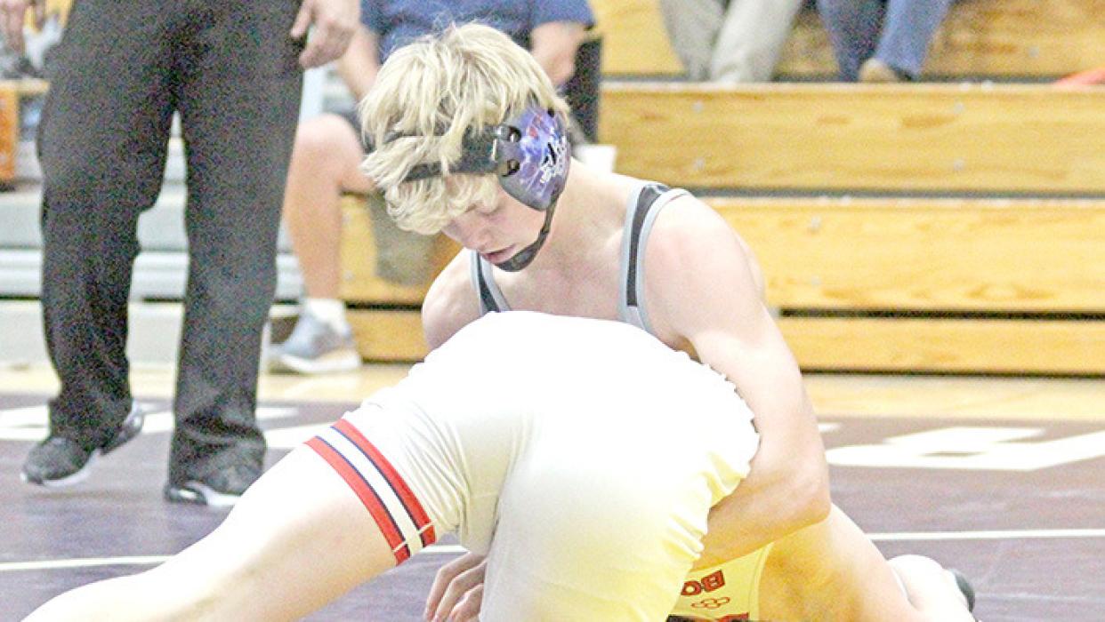 Avery Sengelmann works on a Bon Homme wrestler Saturday at the Winner tournament. Photo by Winner Advocate