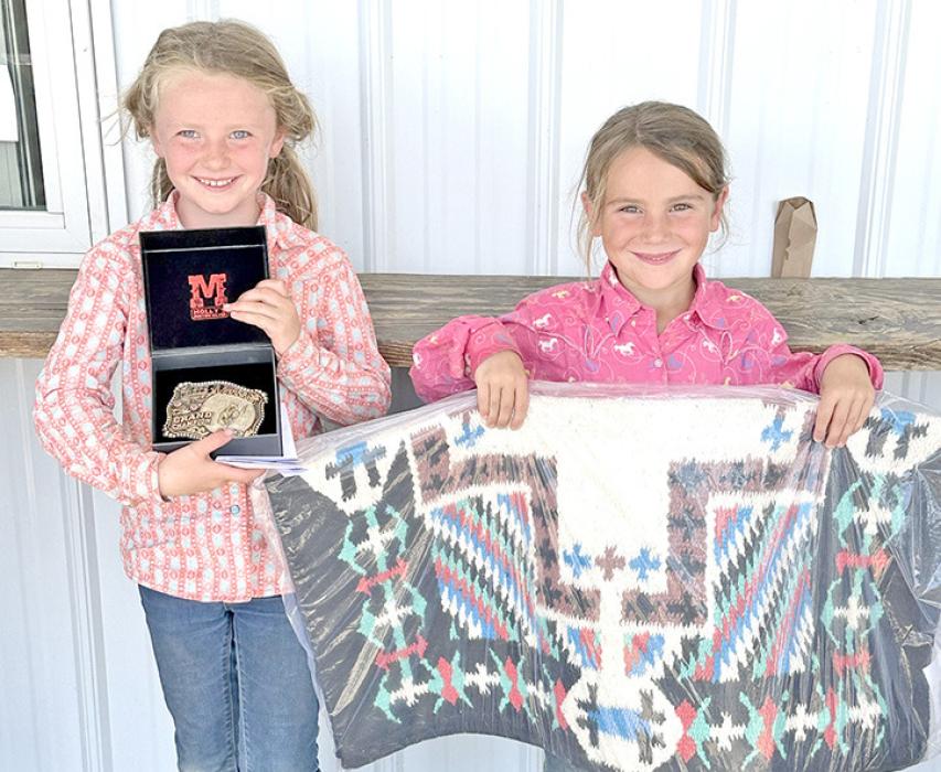 All-Around champion, (l)Dakota Jons of Bonesteel and Reserve All-Around, Ainsley Peppel (r) of Herrick.