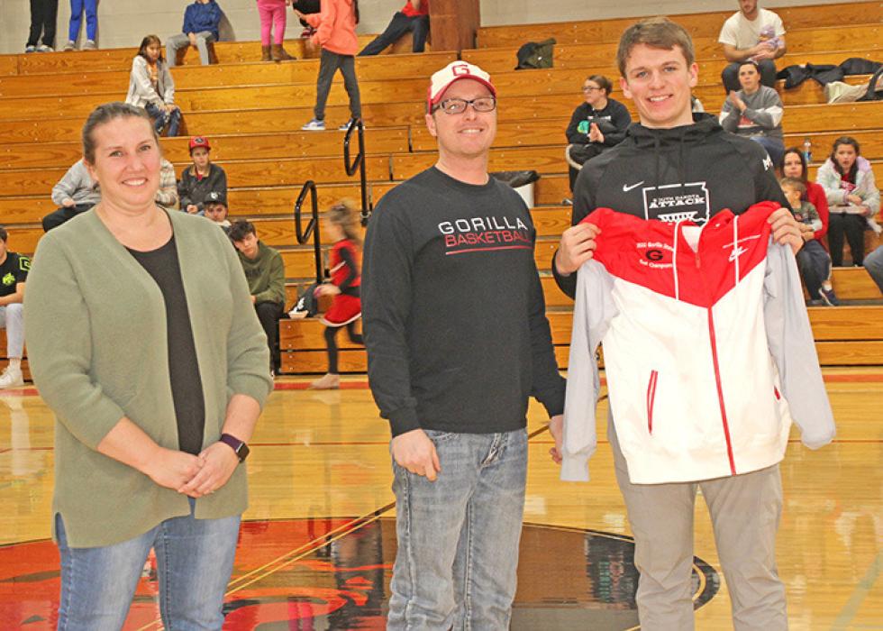 Coy Determan, member of the 2022 state champion golf team, was presented with a jacket from the Athletic Club during the Parkston game on February 3. In addition to the team title, Determan tied for first in the winning effort. The rest of the team received their jackets during coronation.