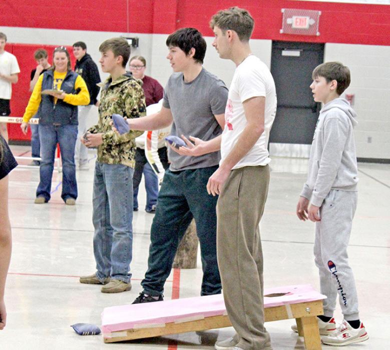 Juniors Ben Stevicks and Isaac Hull “feeding the pig” aka Corn Hole.