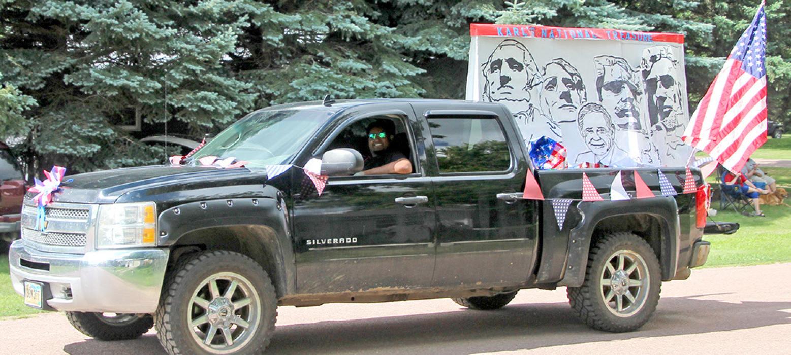 Karl’s TV &amp; Appliance won the humorous division with their depiction of Elmer Karl on Mt. Rushmore.